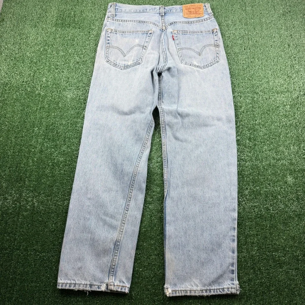 Vintage Distressed Levis 550 Relaxed Fit Light Wash Jeans Mens 33x30 Blue Denim